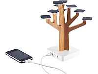 Зарядное устройство для мобильных телефонов и других устройств в форме дерева, работающее от солнечной энергии. В комплекте шнур с разъемом мини-USB